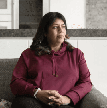 Woman smiling after menopause care