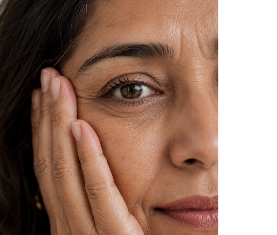 Close-up of a woman's eye reflecting midlife wellness concerns
